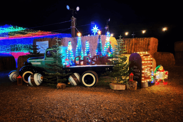 Lost in Christmas event display in Burley of an old flat bed truck filled with lights and Christmas decorations